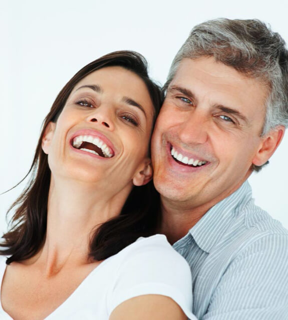 Smiling middle age couple