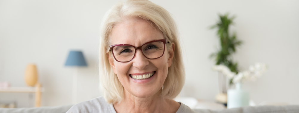 Smiling woman in glasses